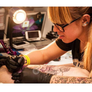 Blonde Girl Tattoo & Piercing