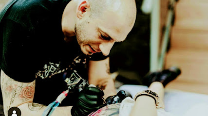 Cuervos De Tinta Tattoo