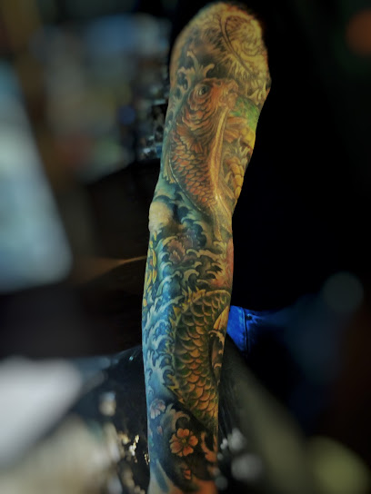 Mil Caminos Tattoo Club