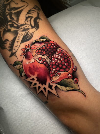 Neptuno Tattoo Piercing