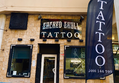 Sacred Skull Tattoo Studio.
