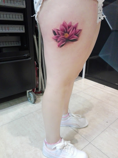 Silver Needle Tattoo