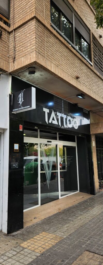 Versus Collective Tattoo