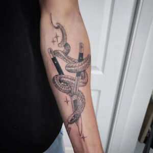 X Amor Al Arte Tattoo